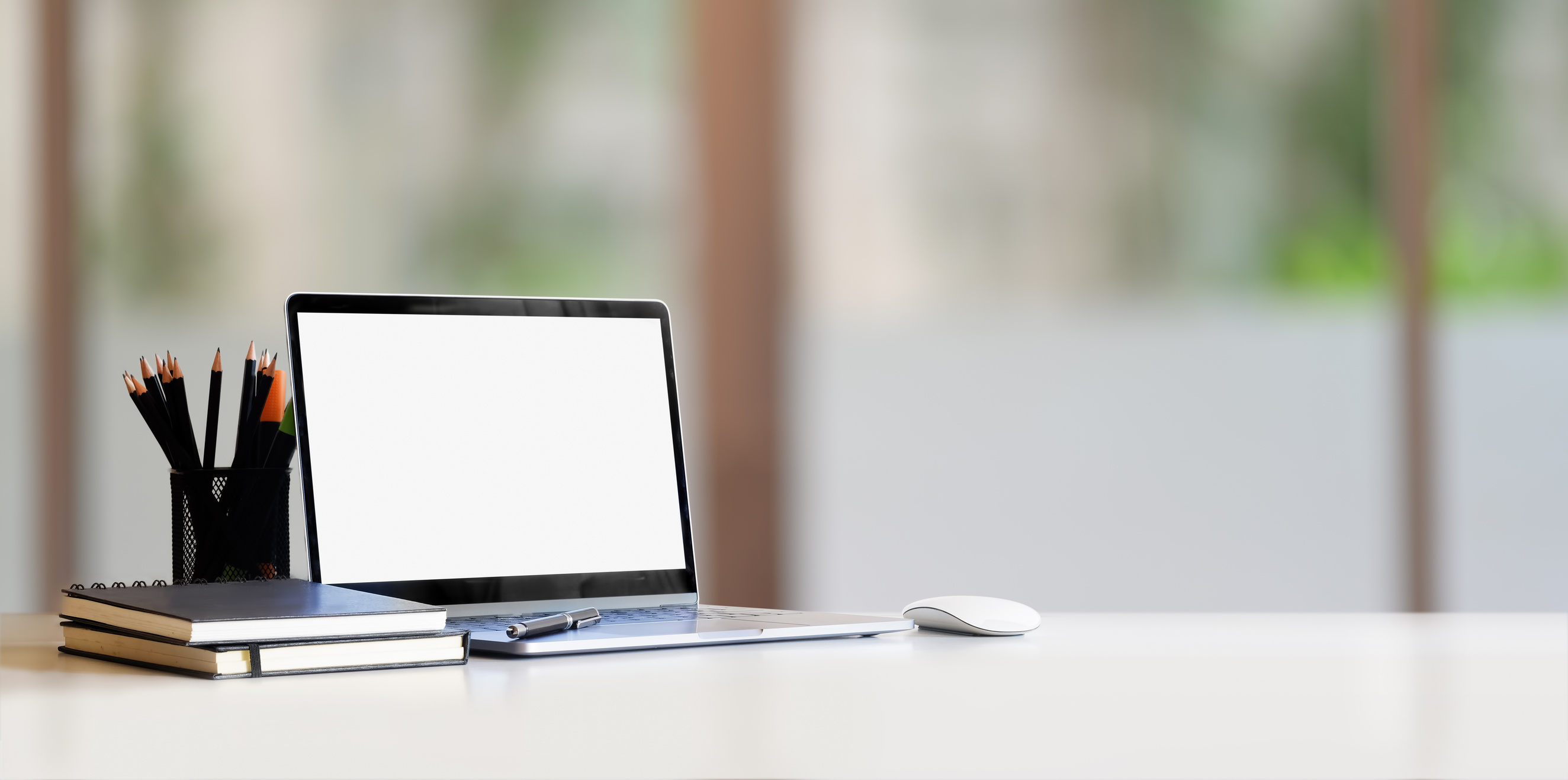 Macbook Pro On White Table